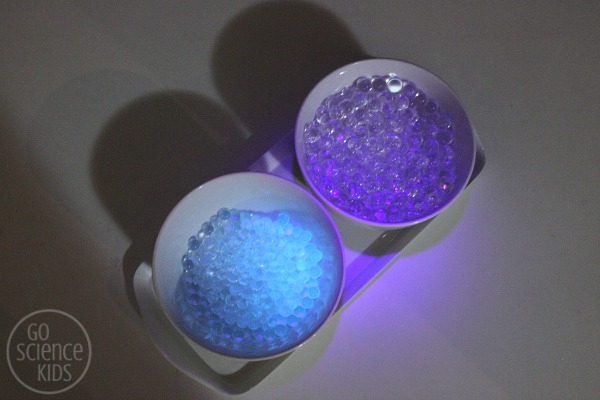 Glowing water beads in low light
