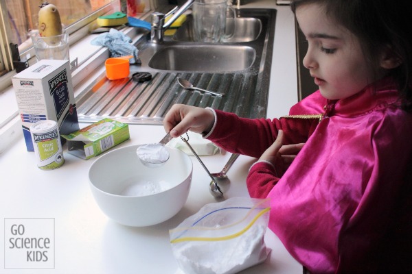 Measuring out ingredients to make sherbet