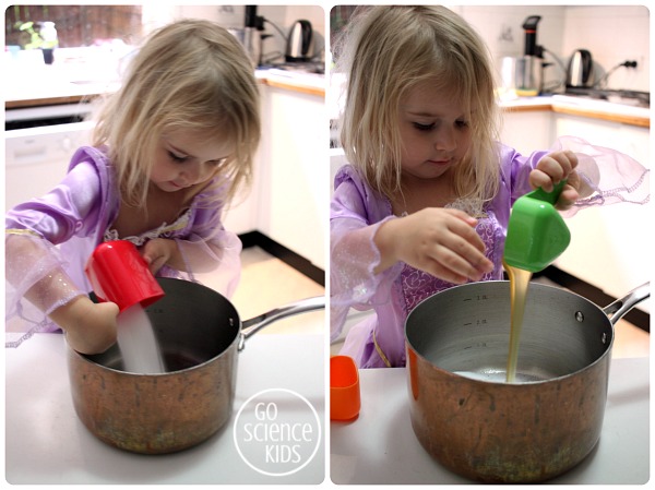 Preschooler adding ingredients to make violet crumble