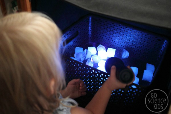 Science and sensory play with edible glowing ice