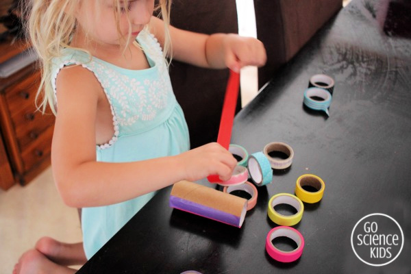 Decorate toilet paper rolls with washi tape & stick on magnets to create a magnetic marble run for the fridge door.