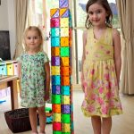 Measuring height with Magna-Tiles is a fun way to explore math and measurement at home